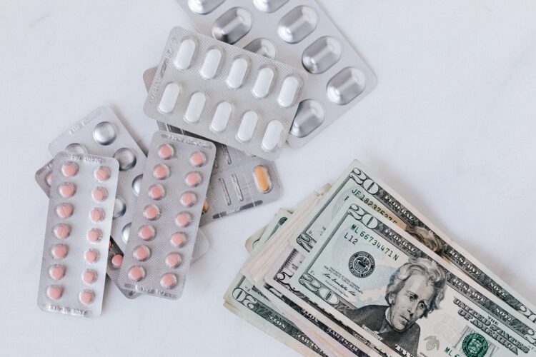 What is the Cost of Packaging, Labeling, Storing, and Distributing Drugs in a Clinical Trial?